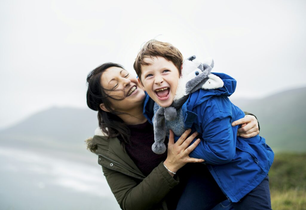 Happy mother and son enjoying together